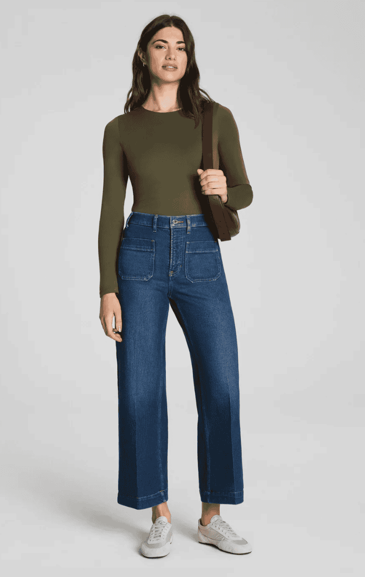 Woman wearing high rise Spanx cropped jeans