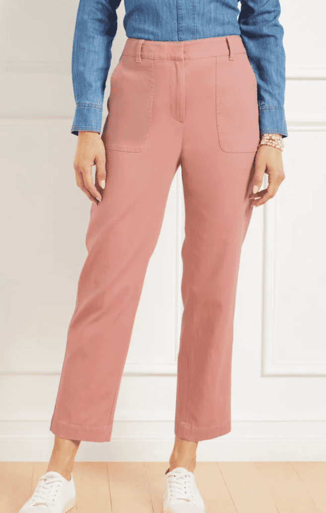 A woman wearing a pair of pull up pants.