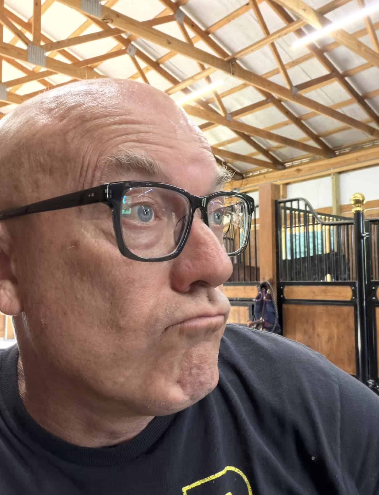 JD wearing Warby Parker Luis Glasses