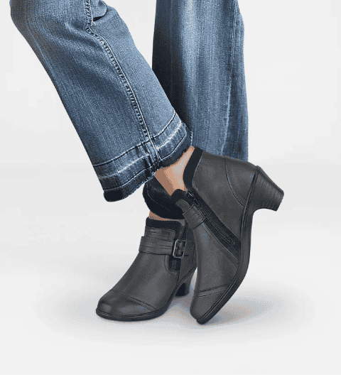 Clarks Kynnzie Rise ankle boot with a low block heel worn with cuffed jeans