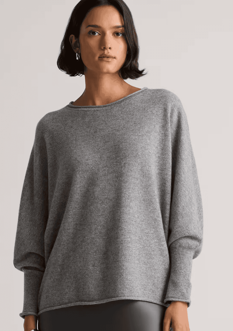 Woman wearing a relaxed cashmere batwing sweater